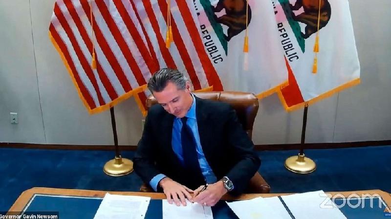Gavin Newsom - signing Reparations Task Force Documents