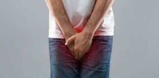 Man Holding Crotch - Groin - iStock-Getty