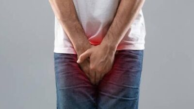 Man Holding Crotch - Groin - iStock-Getty