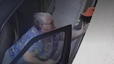 Rachel Scheuerman (slapping black worker)