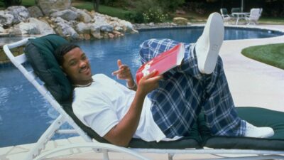 Will Smith sitting in a lounge chair by the pool at his home in Los Angeles, CA in 1996.