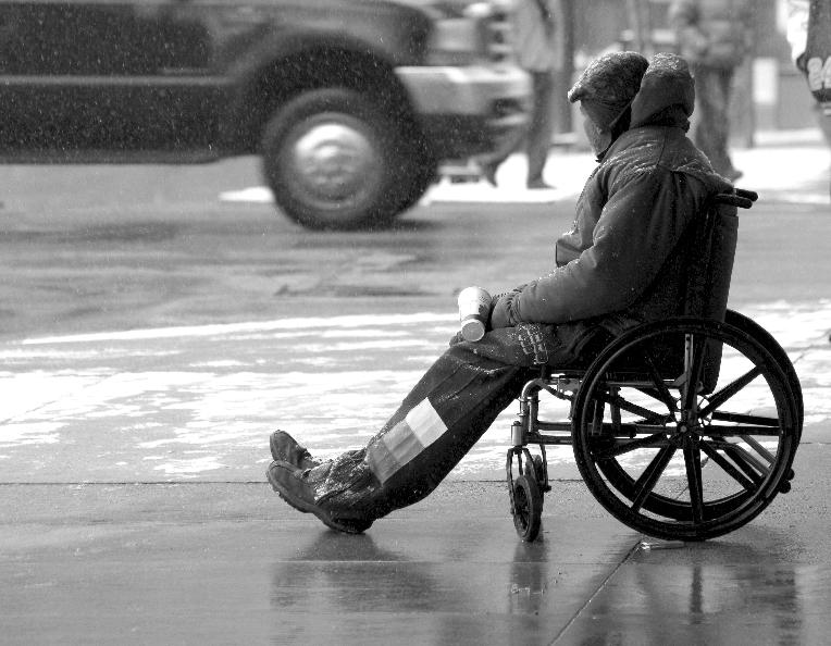 Black Man in Wheelchair - shutterstock