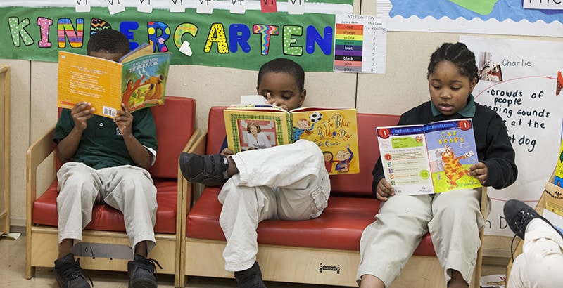 Black students reading - Getty