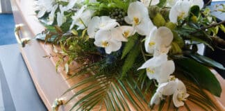 Coffin & Flowers - iStock