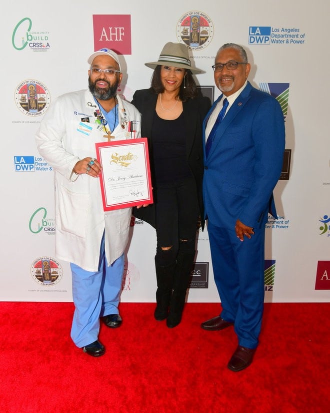 L-R: Dr. Jerry Abraham, Lisa Collins, and Robert Sausado, CEO/President of Community Build, Inc.