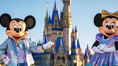 Mickey & Minnie Mouse at Disney World (via Disney)