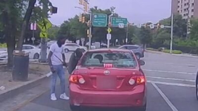 Squeegee Workers Assaulting Driver (WJZ screenshot)