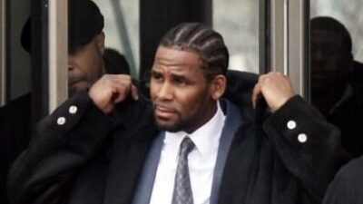 Recording artist R. Kelly leaves Cook County Court after a court hearing in December.