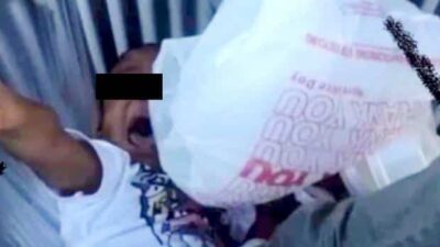 Gang throws 2-yr-old in trash
