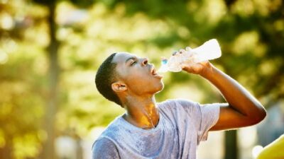 Man drinking water in heat