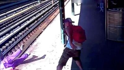 Theodore Ellis (shoving woman onto train tracks - screenshot
