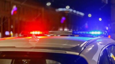 police-car-lights-night-city-with-selective-focus-bokeh_636705-1098