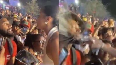 Brittany Renner throws water in man's face