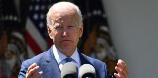 Joe Biden (foreground) - (Nicholas Kamm-AFP-Getty Images)