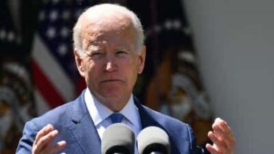 Joe Biden (foreground) - (Nicholas Kamm-AFP-Getty Images)