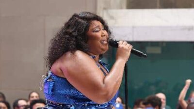 Lizzo performing (Arturo Holmes-Getty Images )