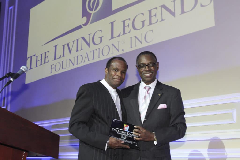 The Living Legends Foundation Chairman David C. Linton presented Living Legends Foundation board member and general counsel Kendall Minter, Esq. with the 2015 organization's Chairman's Awards. (Photo Credit: The Living Legends Foundation)