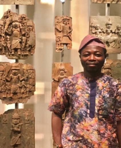Dr Ganiyu Jimoh with the Benin plaques at the British Museum, July 2022