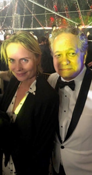 John Pretorius at Oscar Party with actress Rhada Mitchell