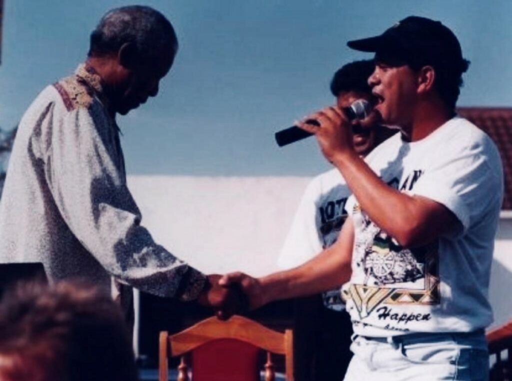 John Pretorius with the late Nelson Mandela.