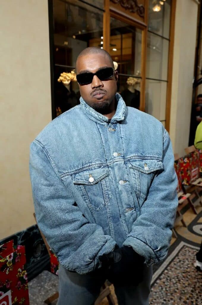 Kanye West (jeans - shades) - Getty