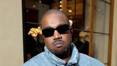 Kanye West (jeans - shades) - Getty