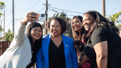 Photo: Assemblymember Mia Bont&agrave; takes selfies with community members in district 18