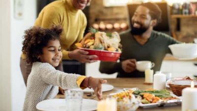 Black Family - Thanksgiving Dinner (photo via CBM)