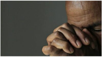 black man praying
