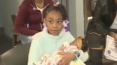 Miracle Moore and baby sister - YouTube screenshot