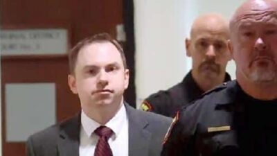 Aaron Dean & sheriffs in court - Getty