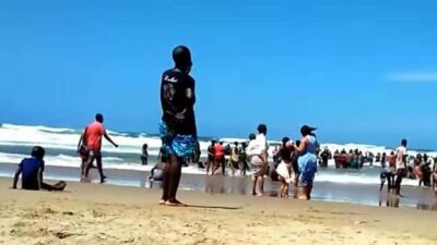 Beachgoers in Durban South Africa - screenshot