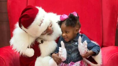 Black Santa and little black girl - CNN screen shot