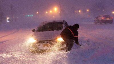 Car Stuck in Snow in New Jersey (Peter Ackerman-Asbury Park Press-USA Today)