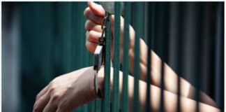 handcuffed in jail