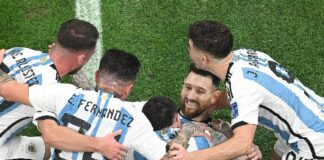 Lionel Messi and Argentina teammates celebrate World Cup victory (Matthias Hangst-Getty Images)