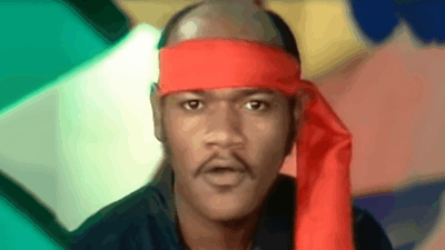 Carl Douglas with red scarf around forehead