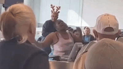 An Alabama woman was arrested at Miami International Airport recently for throwing a computer at an airline agent.&nbsp;