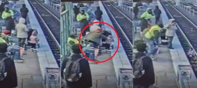 child pushed onto train tracks
