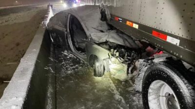 Car dragged 8 miles under semi - via KCTV