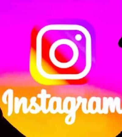 Instagram (person on phone & logo) - Getty