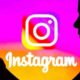 Instagram (person on phone & logo) - Getty