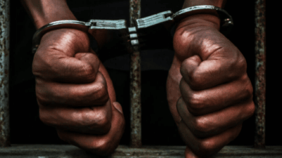 prisoner in handcuffs