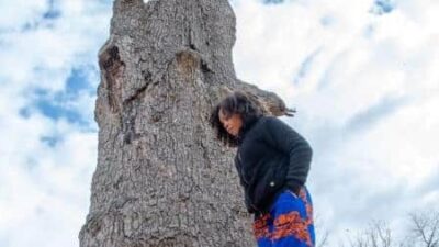 Dr Kerri Moseley-Hobbs walking by the Merry Tree (Credit Rodney Kimbangu-Wesby One)
