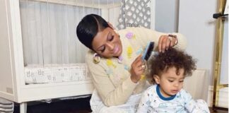 Tamron Hall combs her son Moses' hair / via Instagram