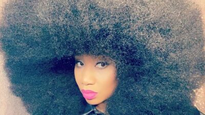 Aevin Dugas shows off her record setting afro
