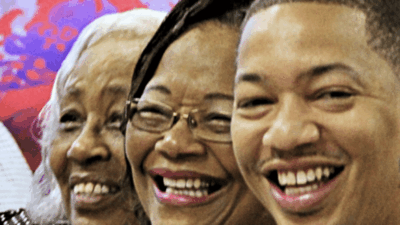 Tyronn Lue poses with his mom and grandma