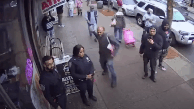 Video shows man about to attack a female NYPD officer