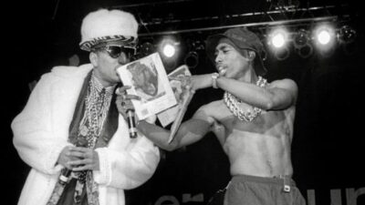Shock G of Digital Underground and Tupac Shakur on stage