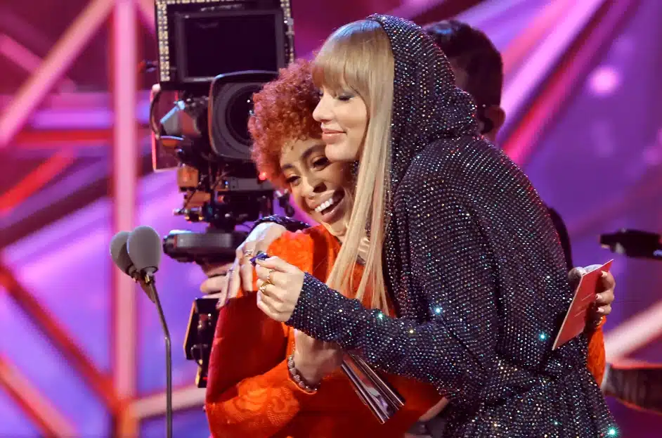 Ice Spice presents the Song of the Year award to Taylor Swift onstage during the 2023 iHeartRadio Music Awards